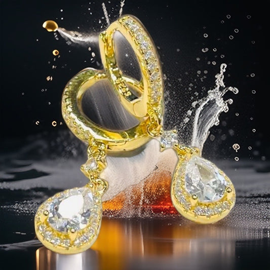 Pisara riipus korvakoru kulta